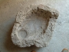 Part of a portal/Recarved as a baptismal font or grain measure (?)