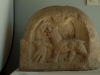 Stone fragment with an image of a bear